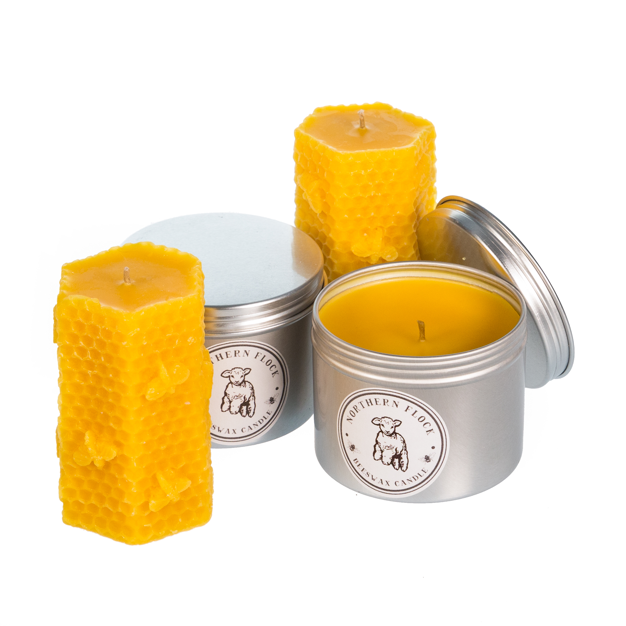 Picture of a Set of 2 Honey scented honeycomb beeswax candles and 2 tins